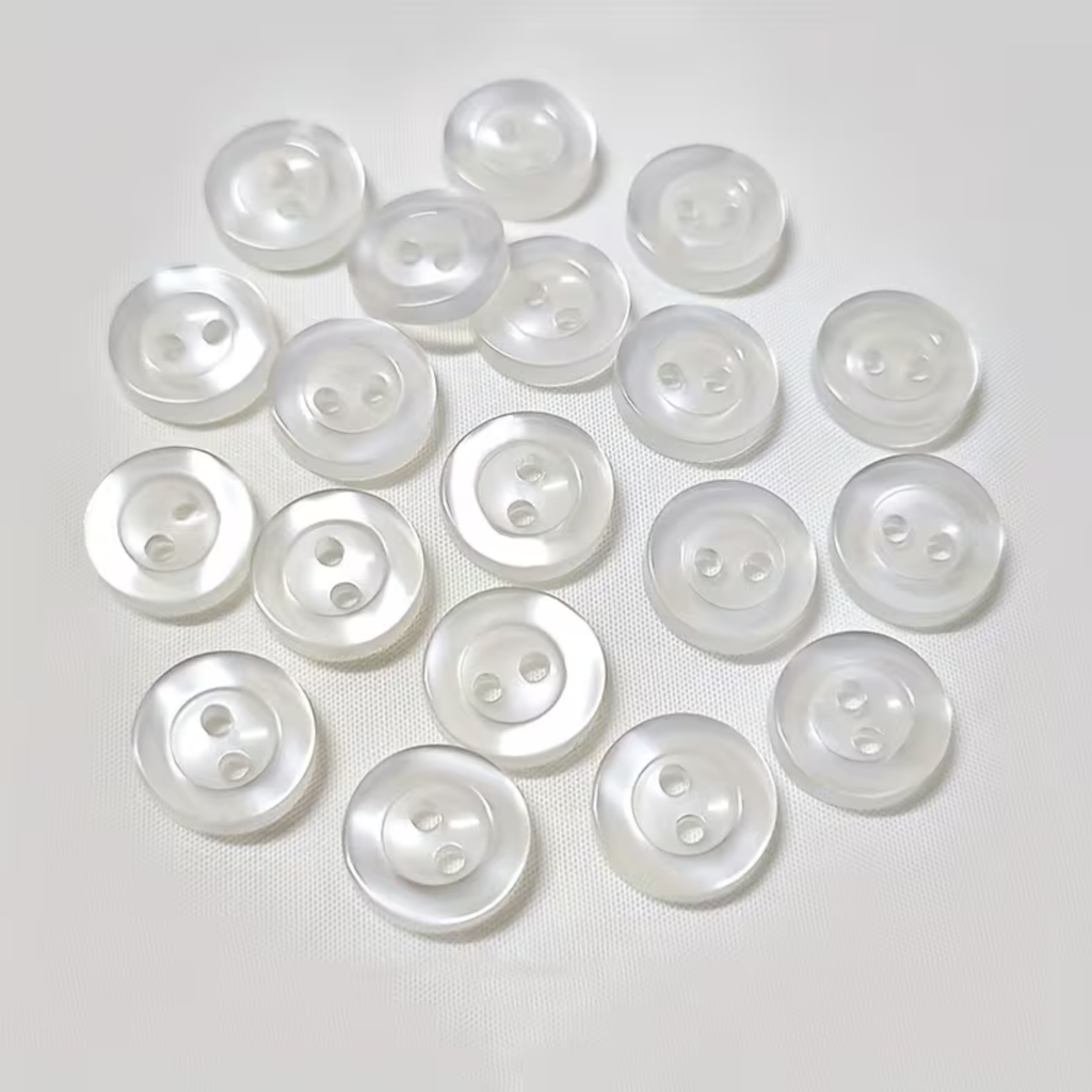 Botón Pasta 4 Hoyos Paq 100pz Transparente Blanco Henry