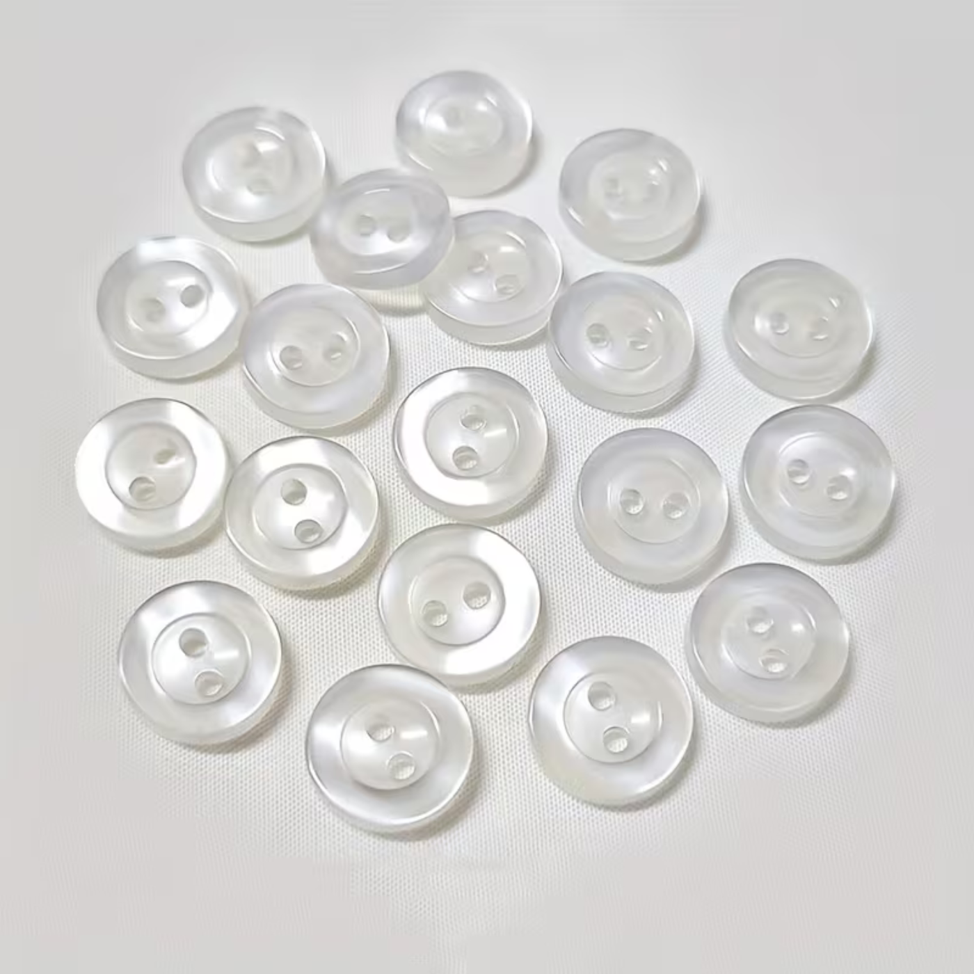 Botón Pasta 4 Hoyos Paq 100pz Transparente Blanco Henry