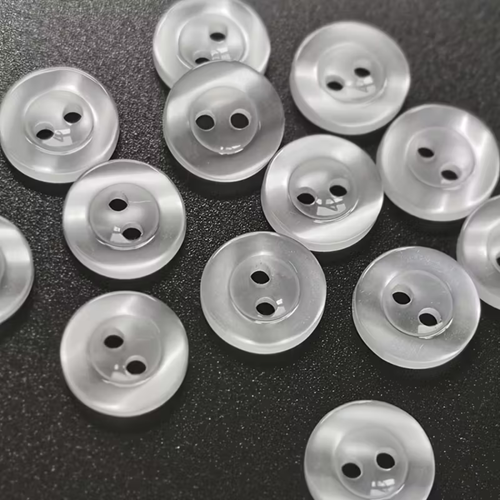 Botón Pasta 4 Hoyos Paq 100pz Transparente Blanco Henry